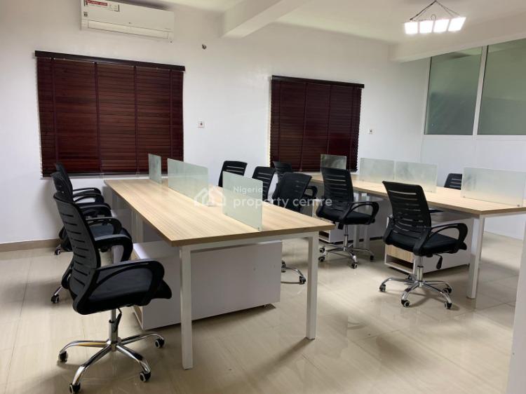 Co-working desks and lounge area